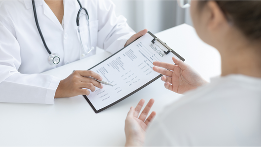 Patient completing a surgery preparation checklist with caregiver guidance.